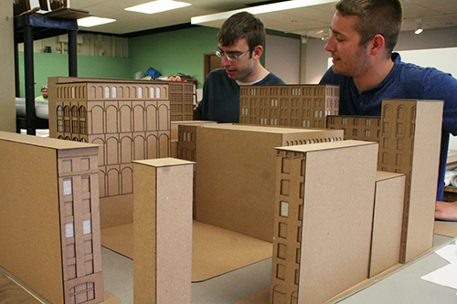 Students building a model