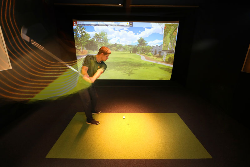 Student practicing in Swing Analysis Lab
