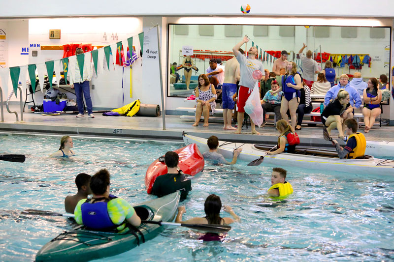 Students practicing Adaptive Sports in swimming pool