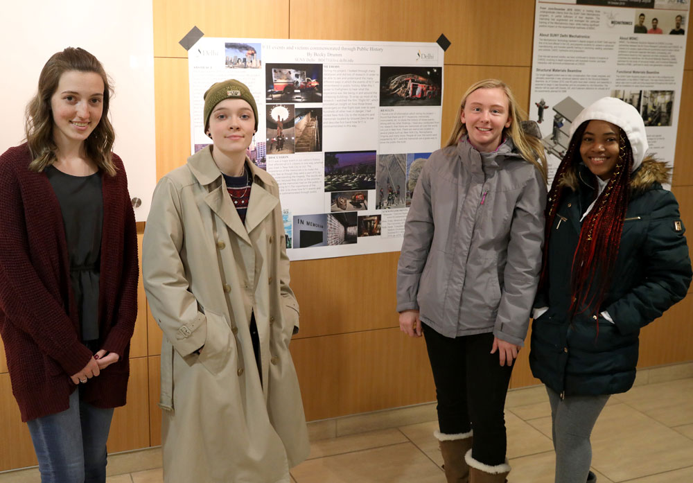 College kids in front of project