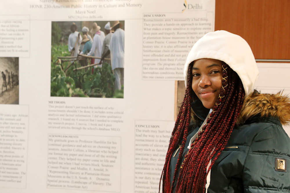 Maya Noel In front of wall project