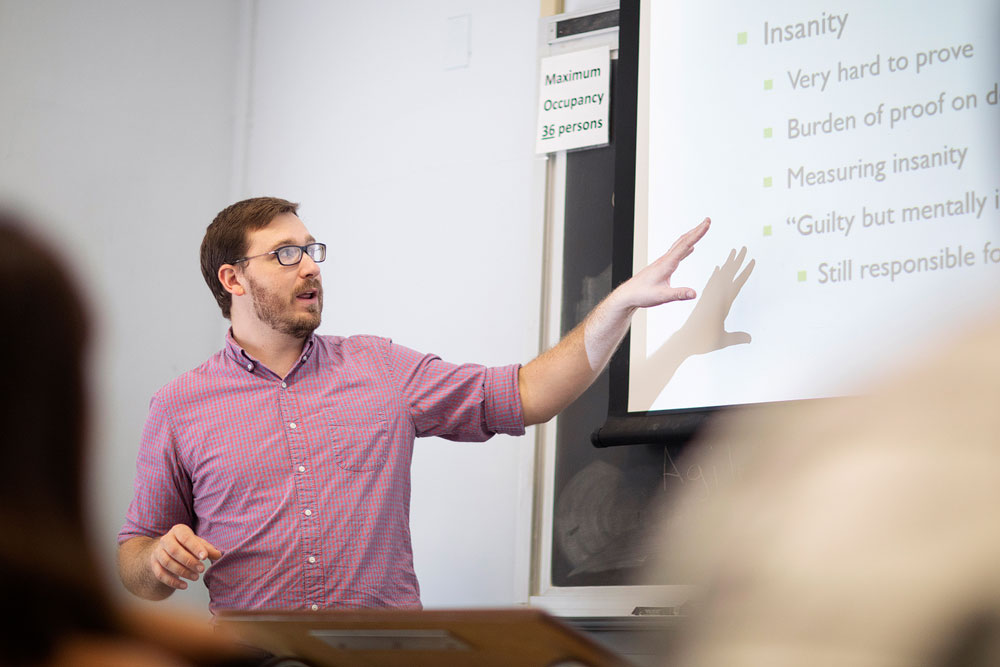 Professor teaching at board