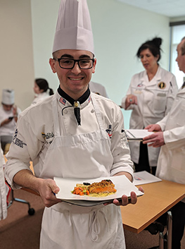 Daniel Hess displaying award winning dish.