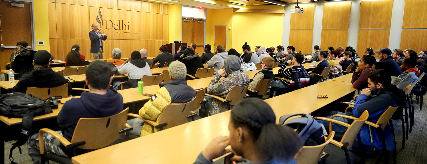 Sanford Hall with students and faculty to listen to Charles Euchner  