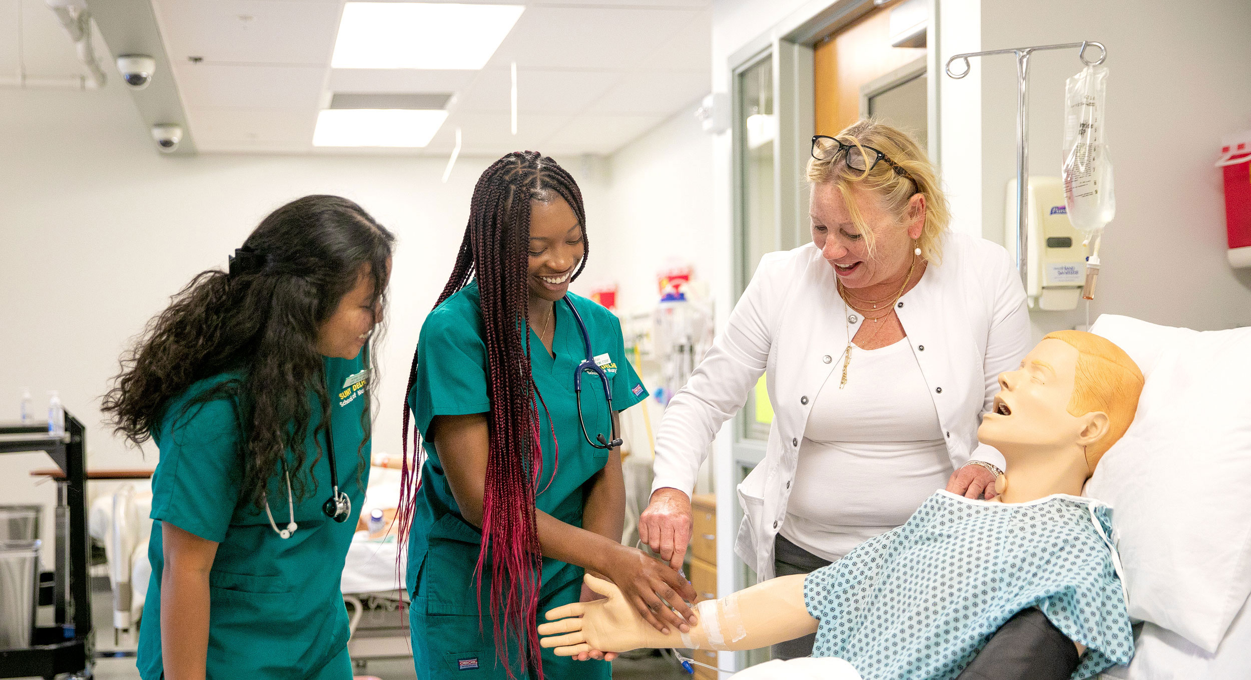 Nursing Students over a CPR dummy