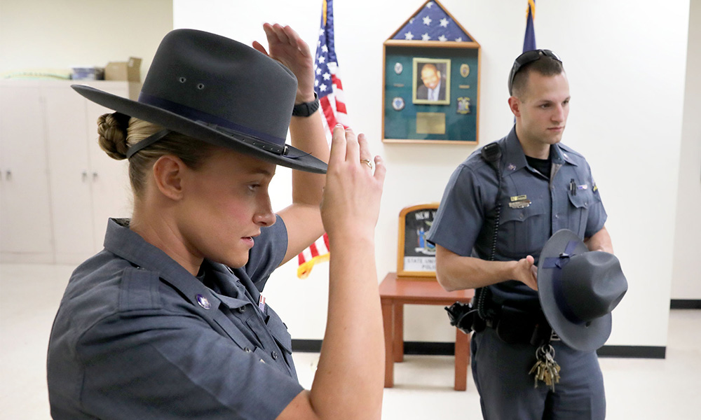 Two new officers in the office preparing for work