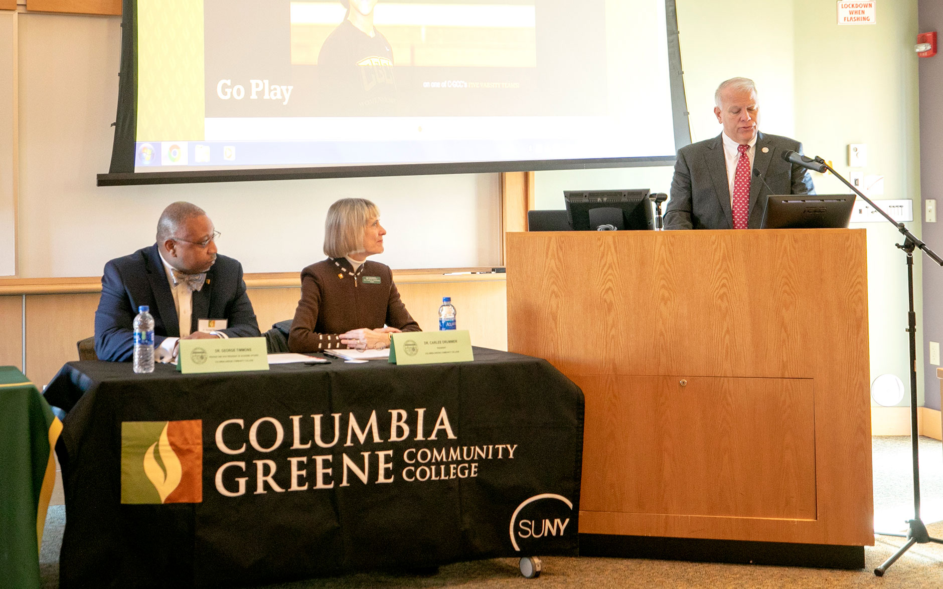 SUNY Delhi president at podium