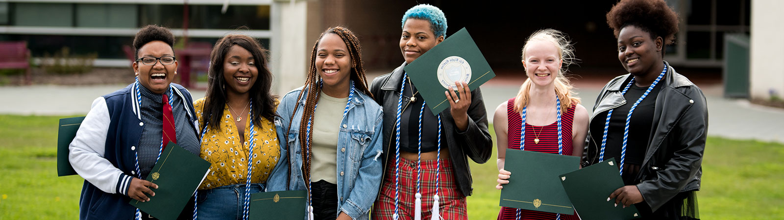 Group of EOP students with their diplomas