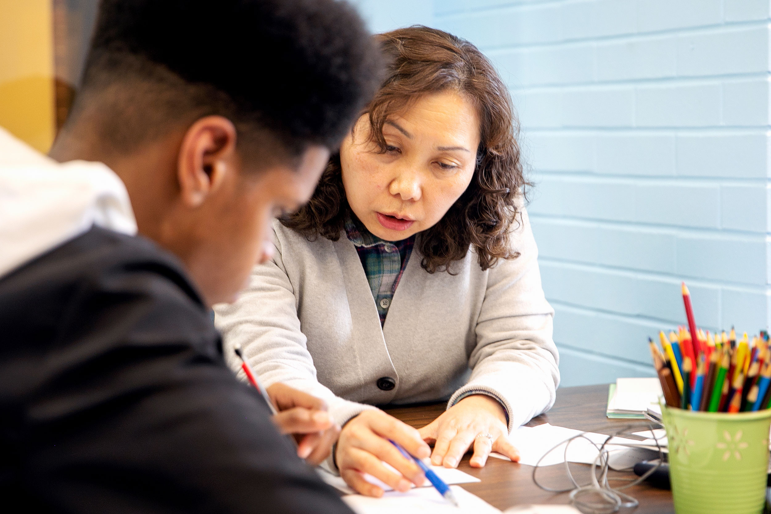 Tutor working with student in the Math Center