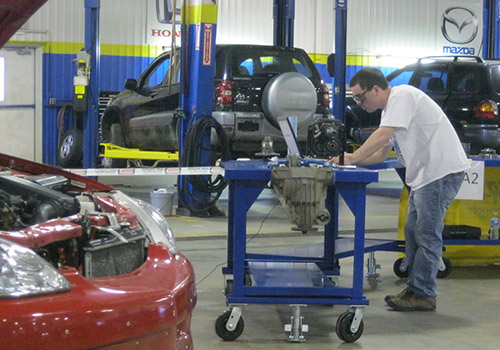 Student working in the automotive shop