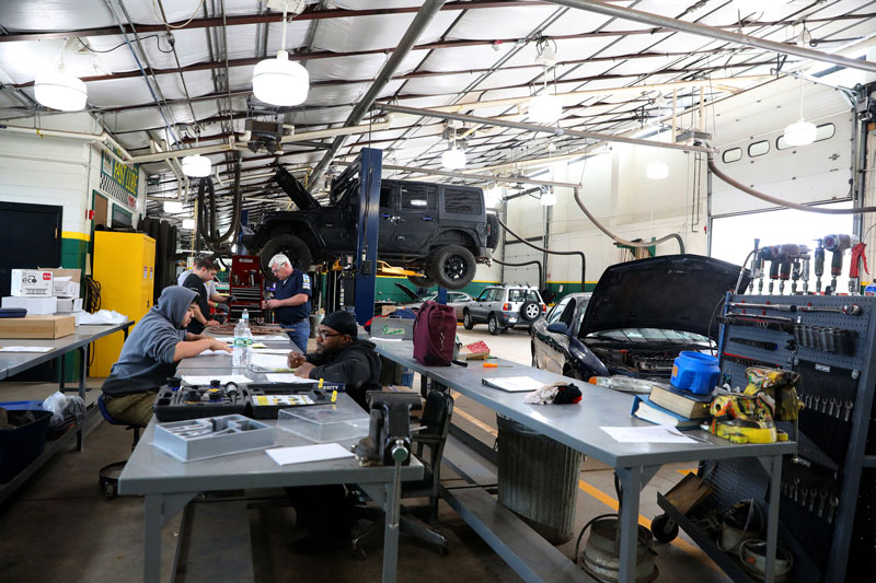 Students working in automotive lab