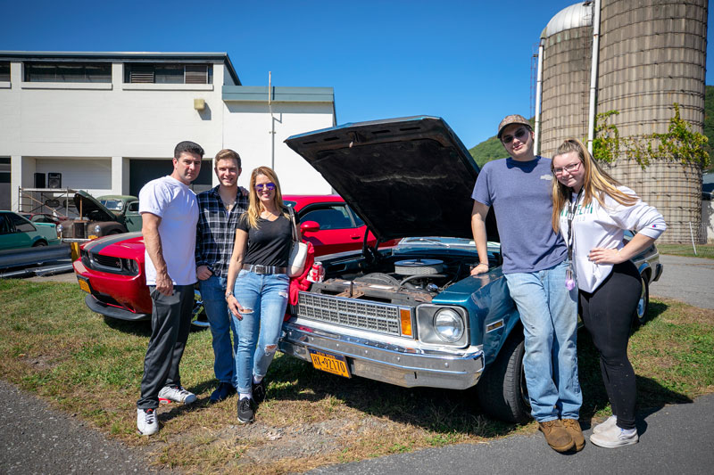 Automotive students and friends at Family Day Car Show