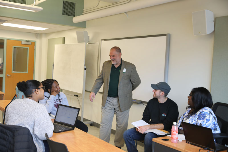 Students and faculty in business classroom