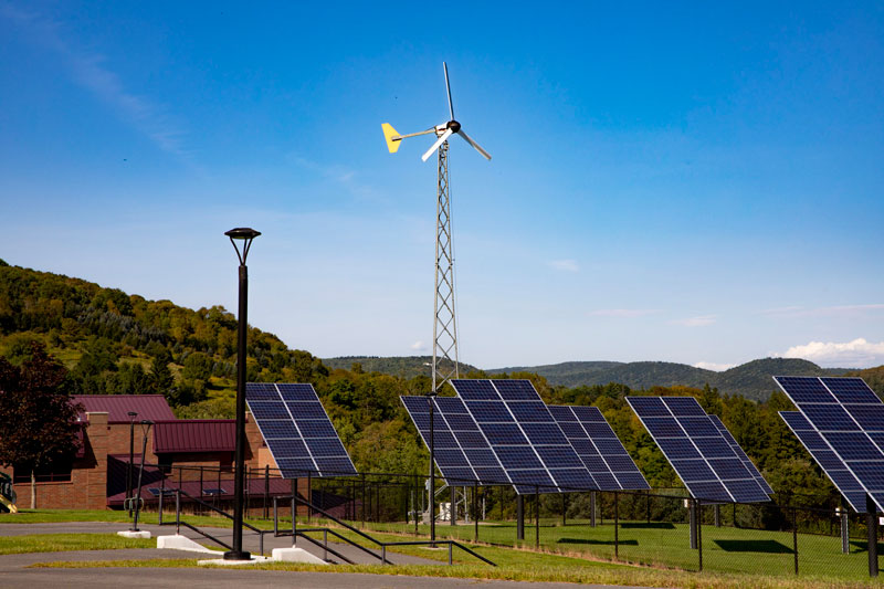 Wind turbine and solar panels at SUNY Delhi