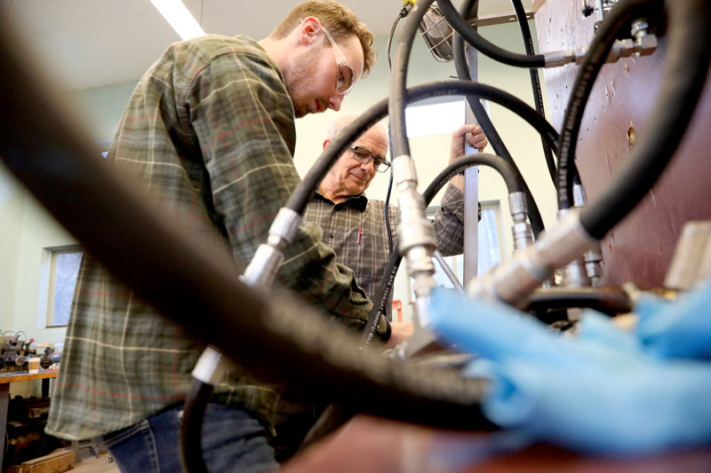 Student and faculty in lab