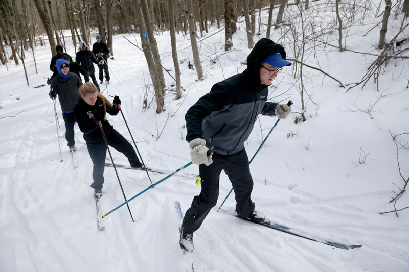 Students cross country skiing