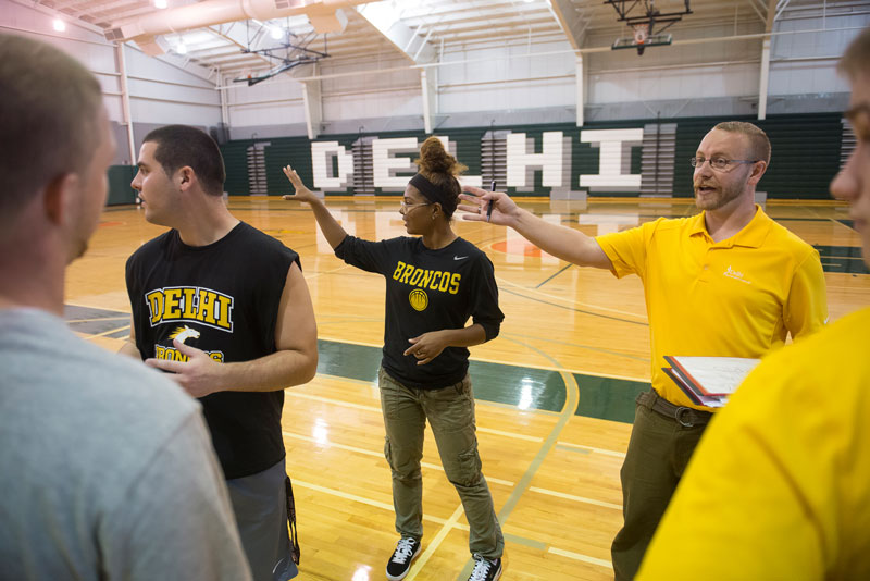 Students and faculty in gym