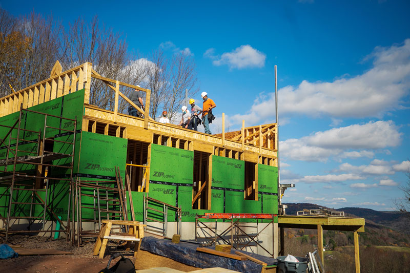 Students building house 