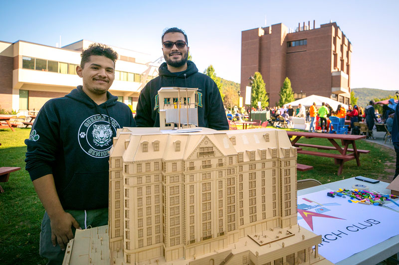Architecture students display building model