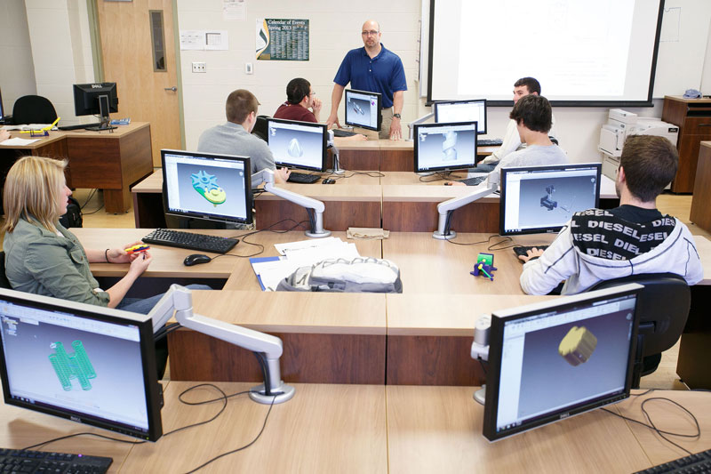 Faculty and students in classroom