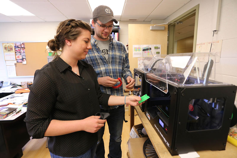 Two students in lab