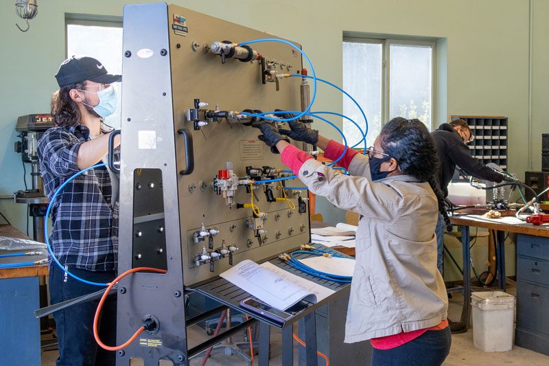 Students working on circuit demonstration board