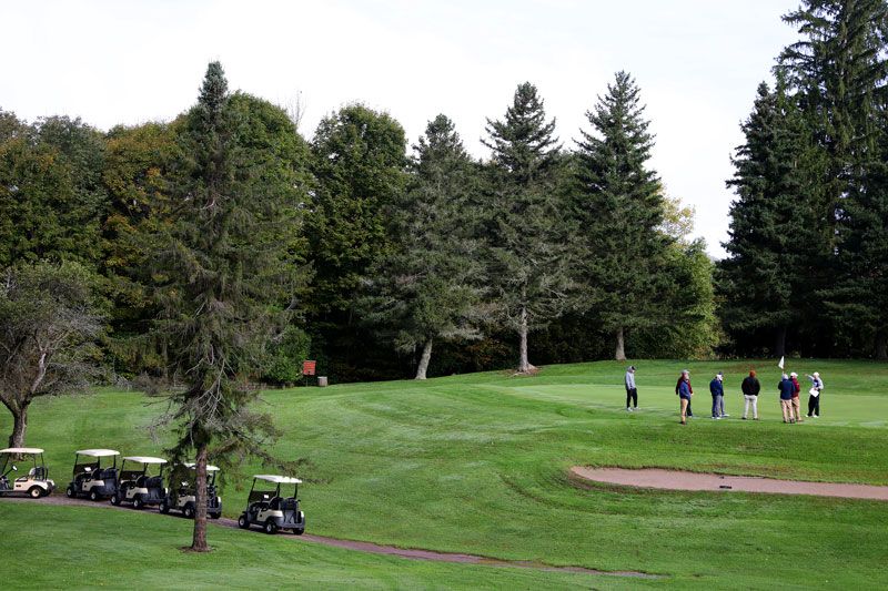 Students on college golf course