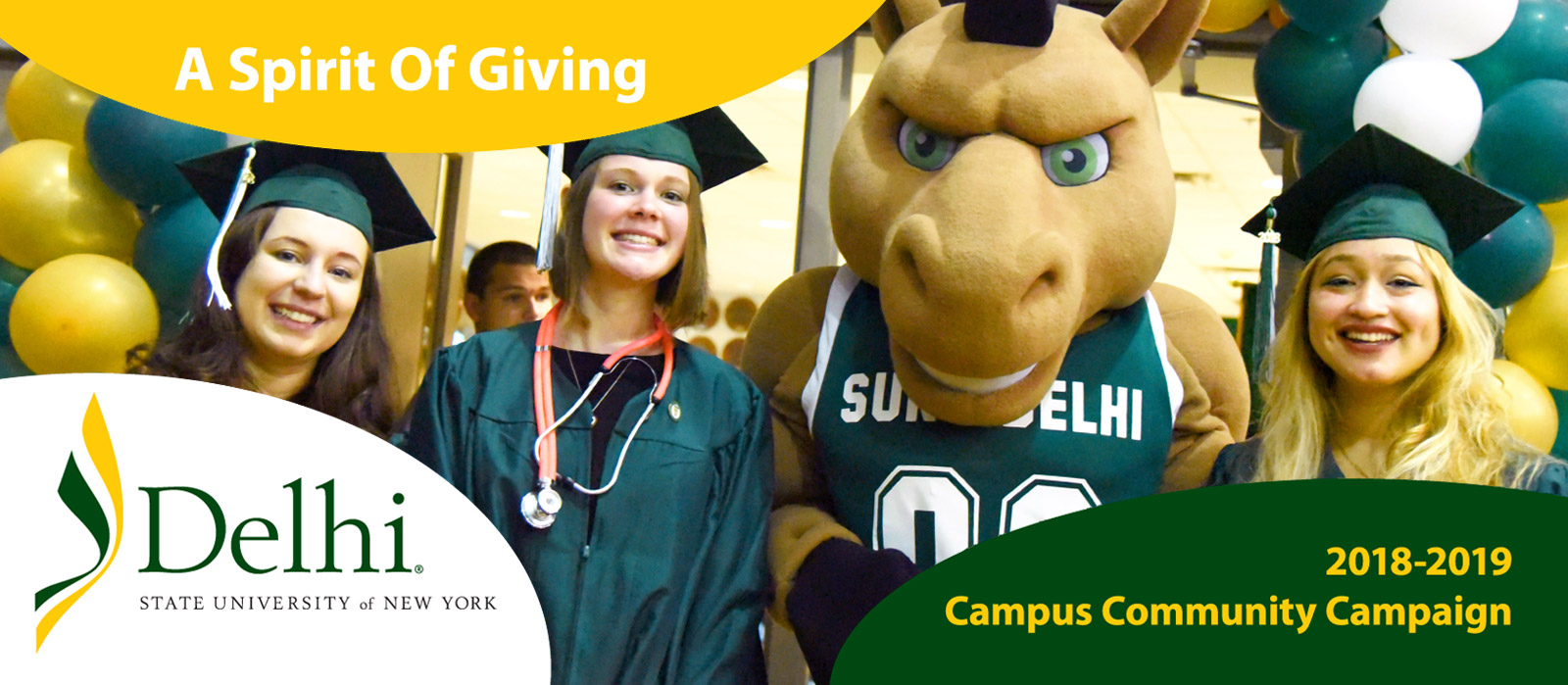 Students at graduation with the mascot Blaze