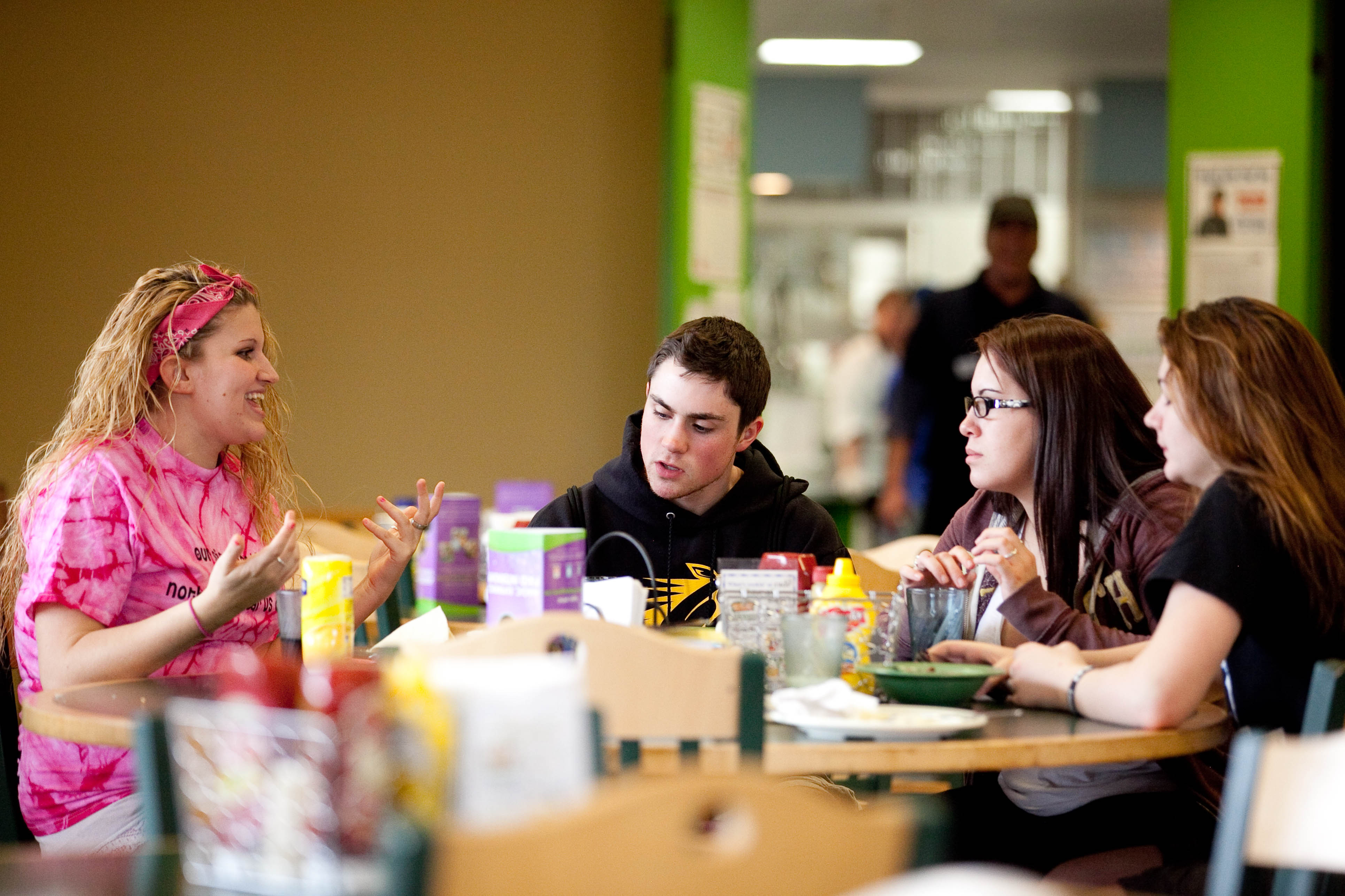 students eating at a table