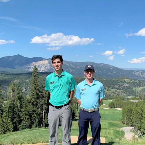 Two Students infront of the Rocky Mountains