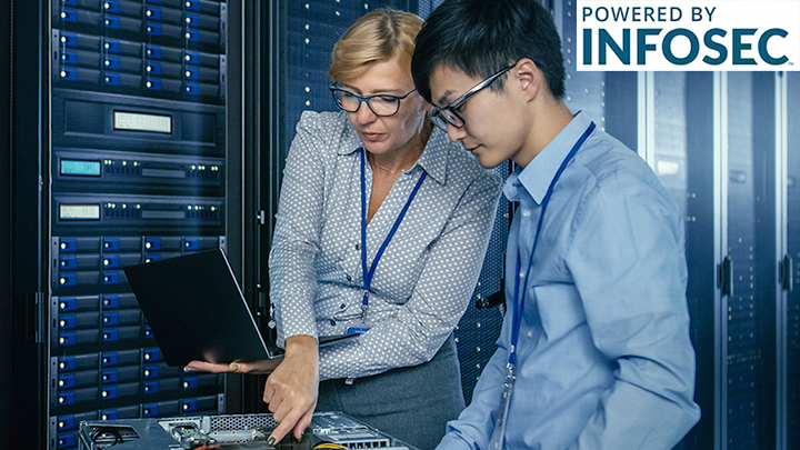 Teacher and student in front of a server wall