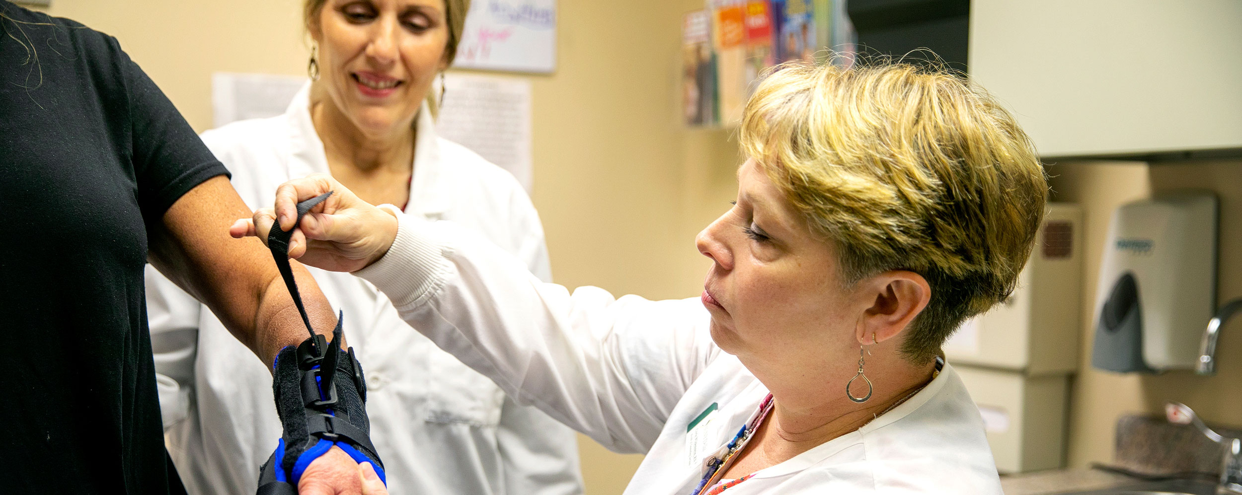 Nurse fitting a cast